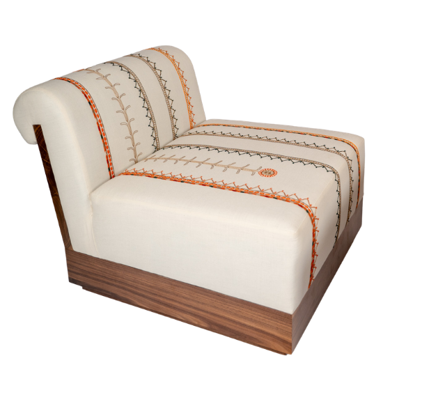 Lounge chair with Tahriri embroidery and a solid walnut base